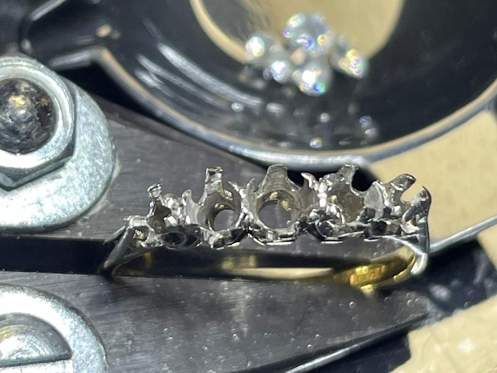 18ct five stone diamond ring replaced with new platinum setting